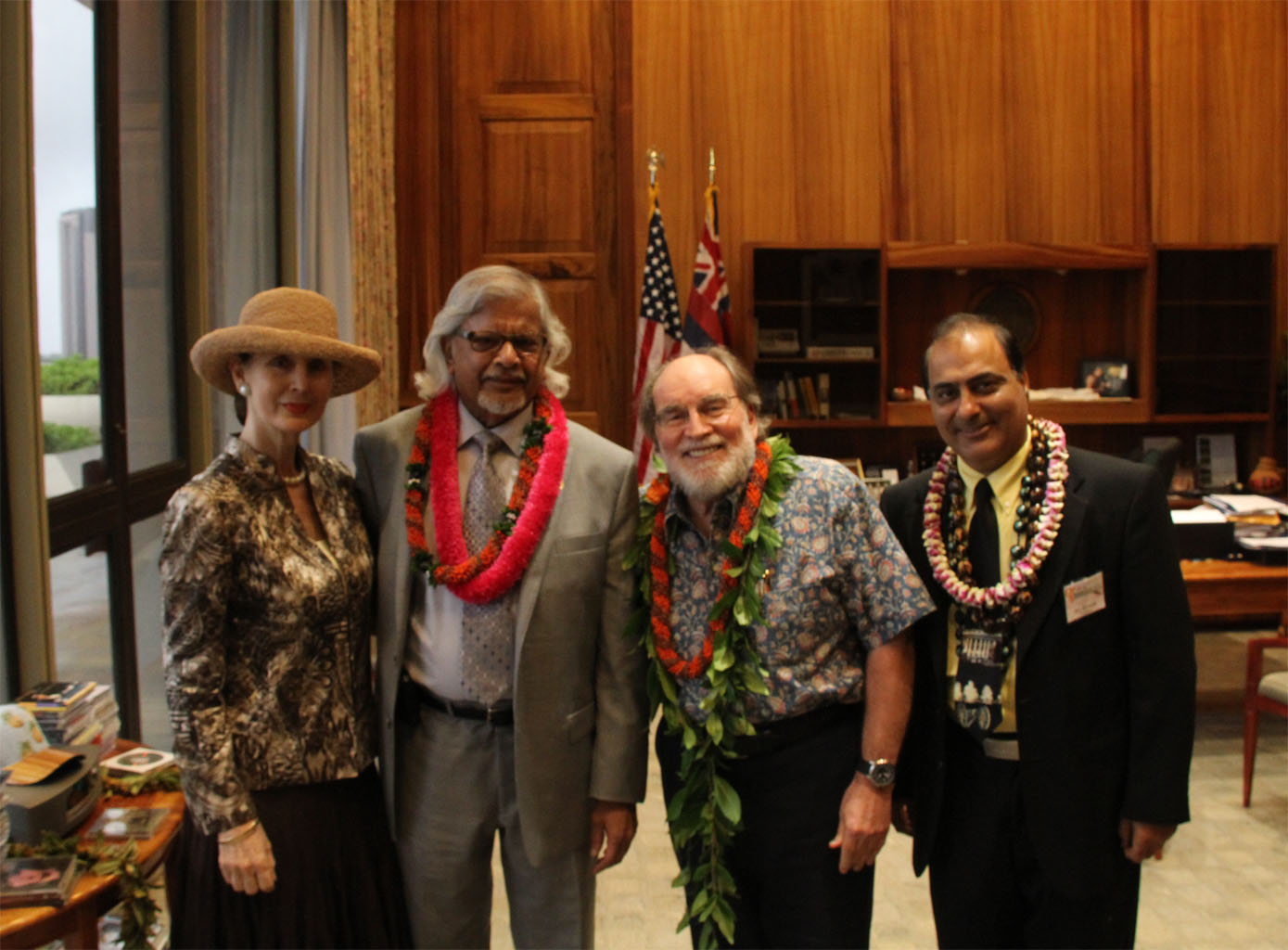 Dr. Raj Kumar with Arun Gandhi, grandson of Mahatma Gandhi and Neil Abercrombie, former Governor of Hawaii.