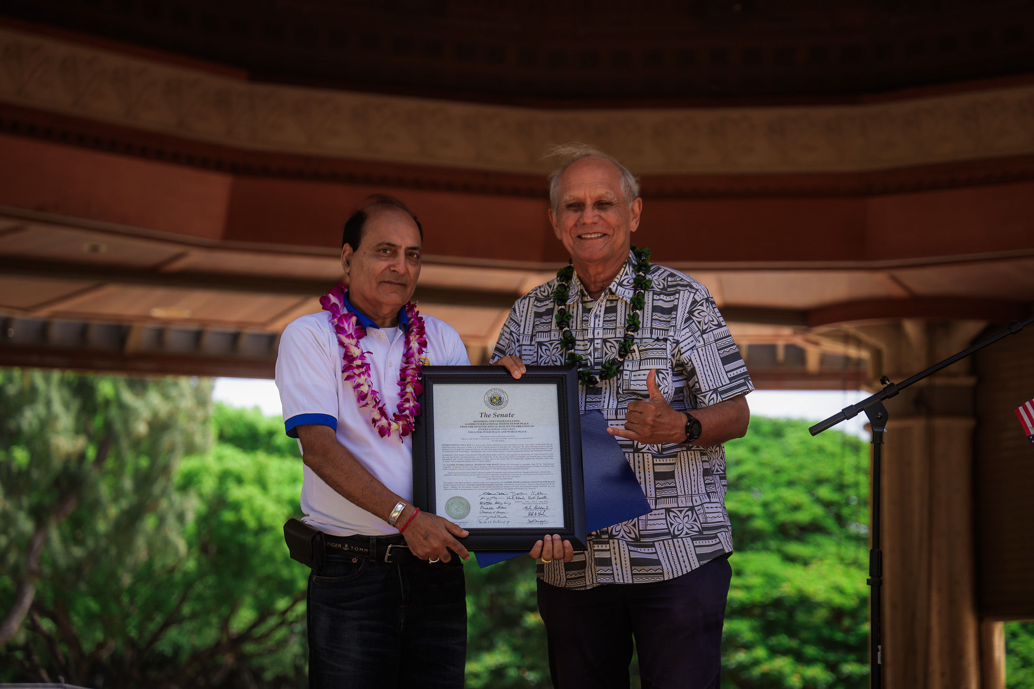 Hawaii Senator, Mike Gabbard, presenting Senate Certificate to Dr. Raj Kumar